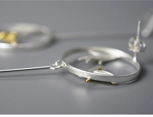 Macro view of S925 sterling silver hallmark on Chinese style bird and bamboo earrings