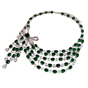 Elegant emerald bow tassel necklace with multi-layer zircon stones on white background