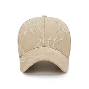 Beige distressed cotton baseball cap with embroidered star patterns on the front