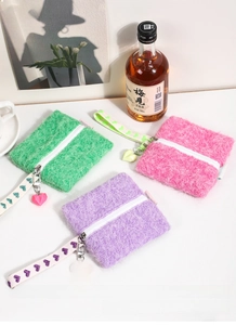 Three plush heart charm makeup pouches in mint green, barbie pink, and taro purple