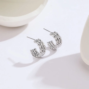 Minimalist silver C-shape titanium steel earrings with textured starlight finish