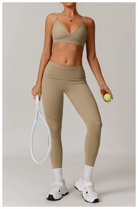 Close-up of tan recycled yoga set featuring V-neck sports bra and high-waist leggings