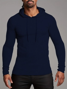 Detail showing navy blue ribbed knit texture on slim fit men's athletic hoodie