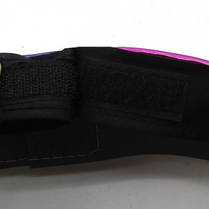 Detail of the adjustable Velcro strap with pink and purple gradient metallic finish