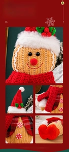 Detail of Christmas gingerbread man doll featuring red velvet hat and checkered scarf
