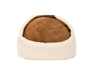 Rear view of brown faux suede winter trapper hat with thick white faux fur lining