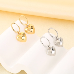 Geometric faceted heart pendant hoop earrings in gold and silver stainless steel finishes