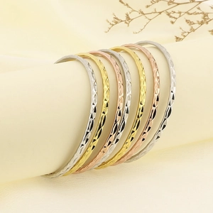 Set of 7 stackable rhombus pattern titanium steel bangles in gold, silver and rose gold