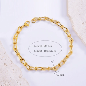Detail view of gold knotted chain bracelet with length and weight specifications