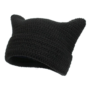 Handmade black knitted cat ear beanie hat with cozy crochet texture for winter warmth