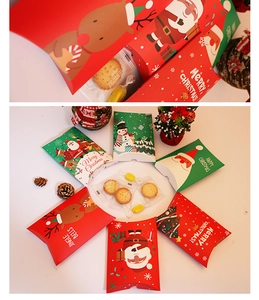 Detail view of colorful Christmas pillow boxes for candy packaging in six holiday designs