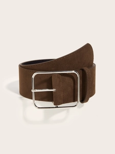 Detail of dark brown suede wide belt featuring a large square silver metal buckle