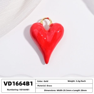 Detailed view of red enamel heart pendant with 20.5mm width and gold brass hook