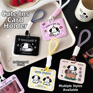 Detail of cute cartoon dog themed card holders with thick matching silicone lanyards
