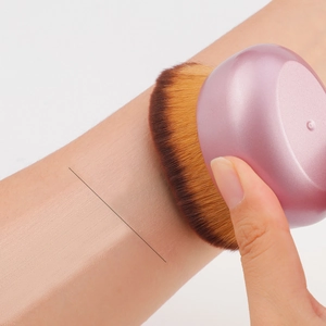 Pink multi-functional flat foundation brush with dense gradient bristles for smooth makeup