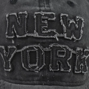 Vintage washed cotton baseball cap with New York embroidery and distressed frayed edges
