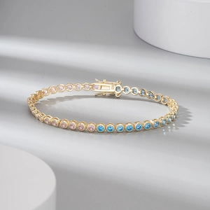 Detailed macro view of S925 tennis bracelet with pink and blue round-cut zircon stones