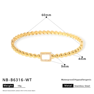 Detailed size specifications of a gold beaded heart bracelet with 60mm inner diameter