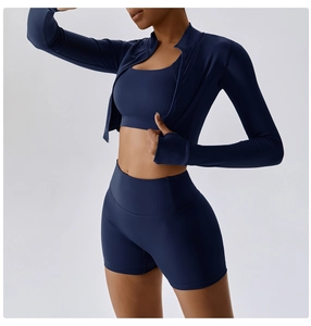 Three-piece dark blue fitness set with slim jacket, sports bra and high-waist shorts