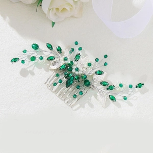 Silver bridal hair comb with emerald green crystals, white pearls and metal leaf details