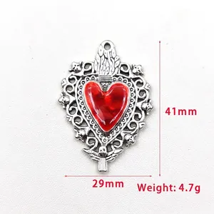 Gothic silver zinc alloy sacred heart pendant with red enamel and angel details