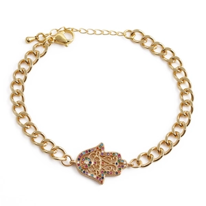 Bracelet Main de Fatma dorée avec œil porte-bonheur en zircon et maille gourmette