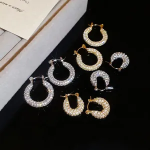 U-shaped gold and silver plated hoop earrings with zircon pavé in various sizes