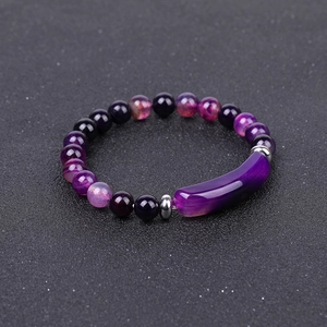 Detail view of purple gemstone bracelet with 8mm natural beads and stainless steel bar