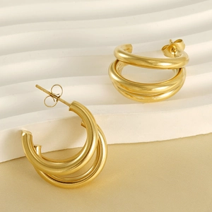 Macro detail of triple-layer 18K gold plated stainless steel C-shape stud earrings