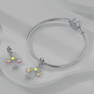 Detail of silver snake chain bracelet with Libra constellation and family forever engraving