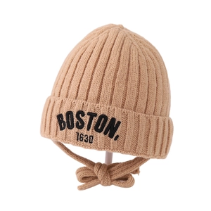 Cream knit baby beanie with BOSTON 1630 embroidery and matching chin straps
