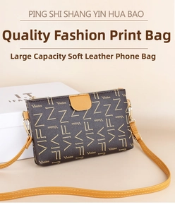 Detail of soft leather crossbody phone bag with brown letter print and metal hooks