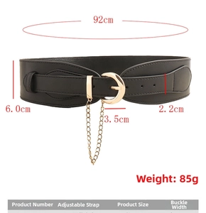 Detailed view of 6cm wide black waist belt with gold buckle and chain, 92cm length