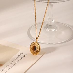 Vintage gold necklace with round tiger eye stone pendant and textured steel finish