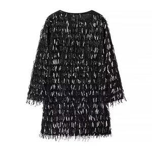 Women's black mini dress featuring long sleeves and sparkling sequin fringe details