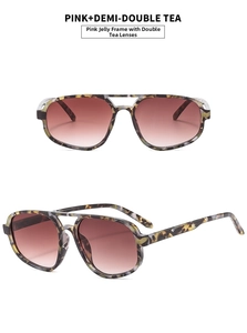 Detail view of retro pilot sunglasses in pink demi frames and double tea gradient lenses
