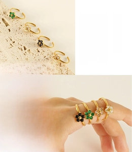 Detailed view of 18k gold plated stainless steel floral rings with colorful zirconia stones