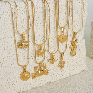 Gold plated titanium steel animal necklaces featuring spider crab and snake pendants
