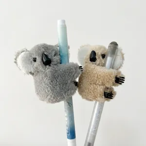 Cute plush koala hair clip and pen holder accessory in grey and light brown soft fur