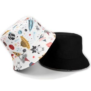 Reversible bucket hat with sci-fi space cartoon prints and plain black minimalist design