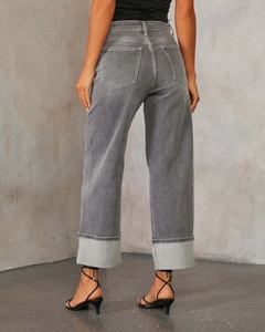 Detailed back view of high waist wide leg grey jeans with trendy wide folded cuffs