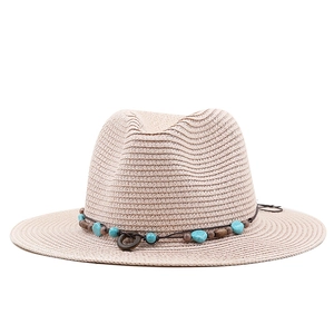 Women's beige straw panama hat with turquoise beads and wood ornaments for beach sun protection