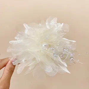 Elegant white mesh flower hair claw clip with faux pearls and translucent organza petals