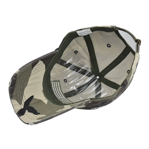 Internal view of camouflage cotton baseball cap showing sweatband and 100% cotton label