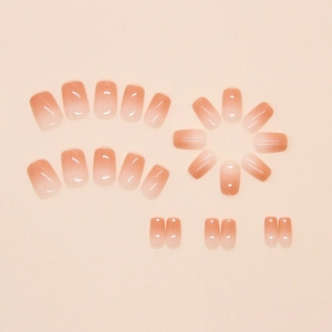 Short square ombre pink press-on nails with a glossy jelly finish and nude gradient
