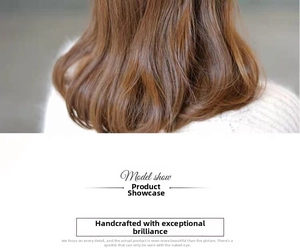 Detail view of long brown wavy hair extension styled with a flower hairpin for women