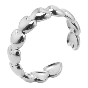 Macro shot of silver heart-shaped chain ring detail showing polished 304 stainless steel