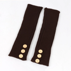 Close-up of dark brown cable knit leg warmers featuring decorative wooden buttons
