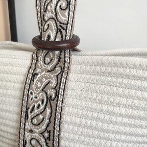 Japanese woven cotton rope handbag with paisley pattern straps and wooden ring detail