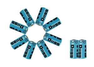 Blue biodegradable dog poop bags 10 rolls set arranged in a geometric layout on white background
